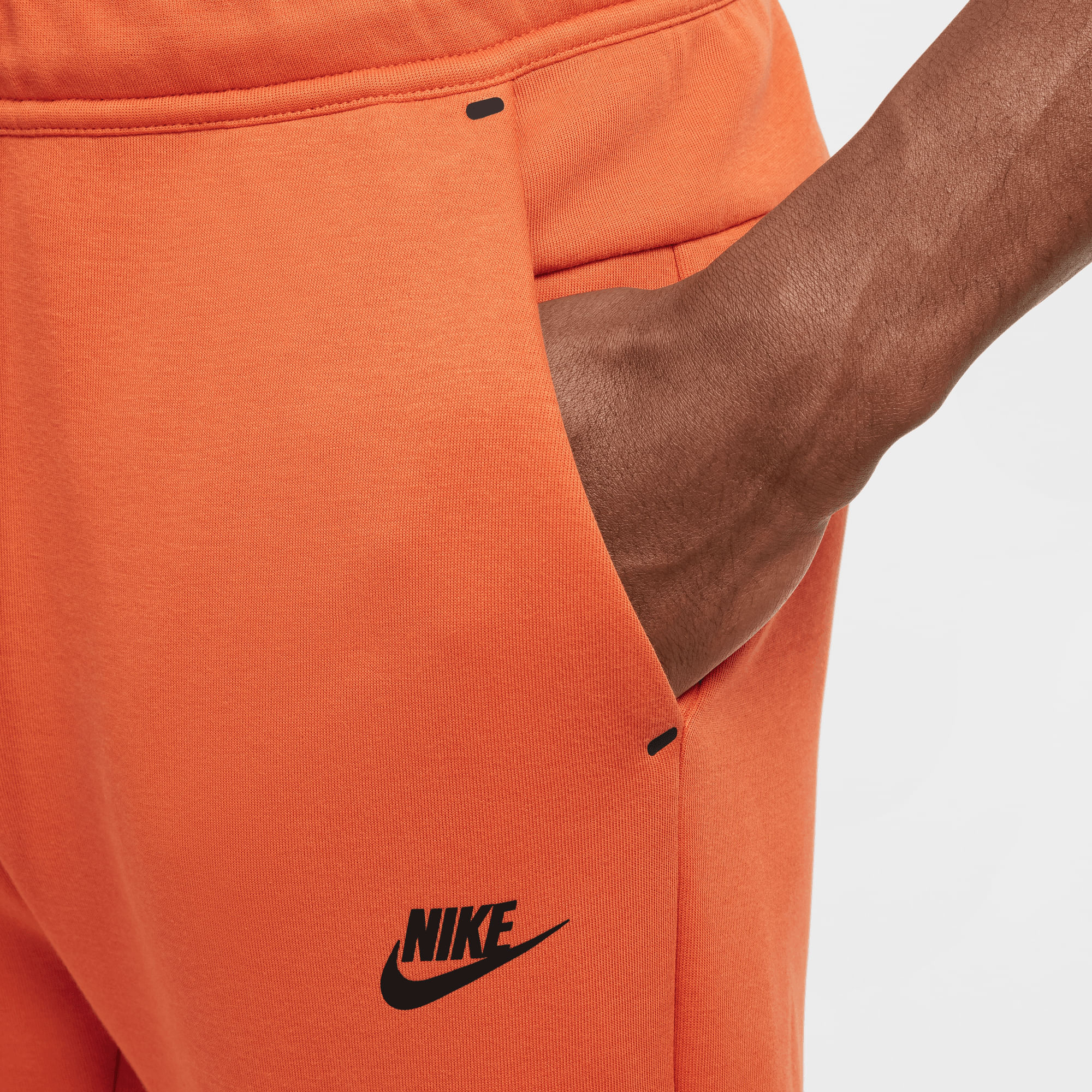 pantalon naranja nike